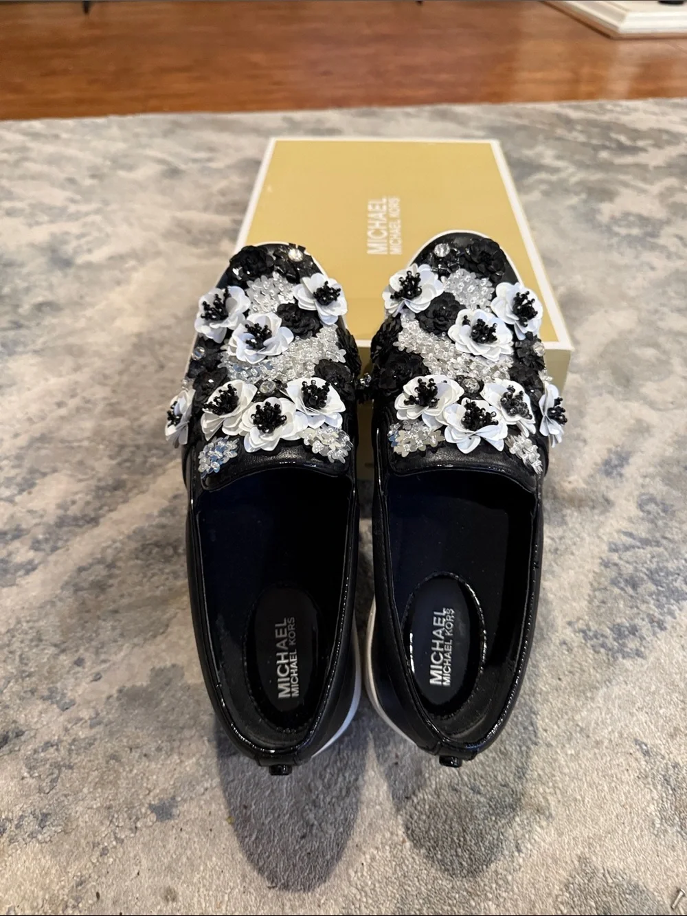 Michael Kors Black and White Floral Embellished Slip-On Sneakers - Picture 3 of 6